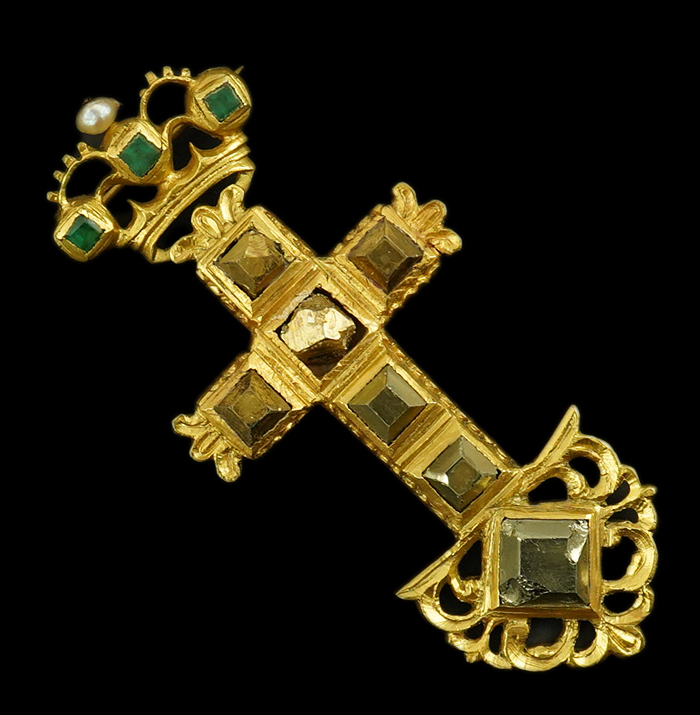 An antique continental engraved gold and seven stone pyrites? set cross pendant, with a gold, emerald and seed pearl set suspension brooch attachment